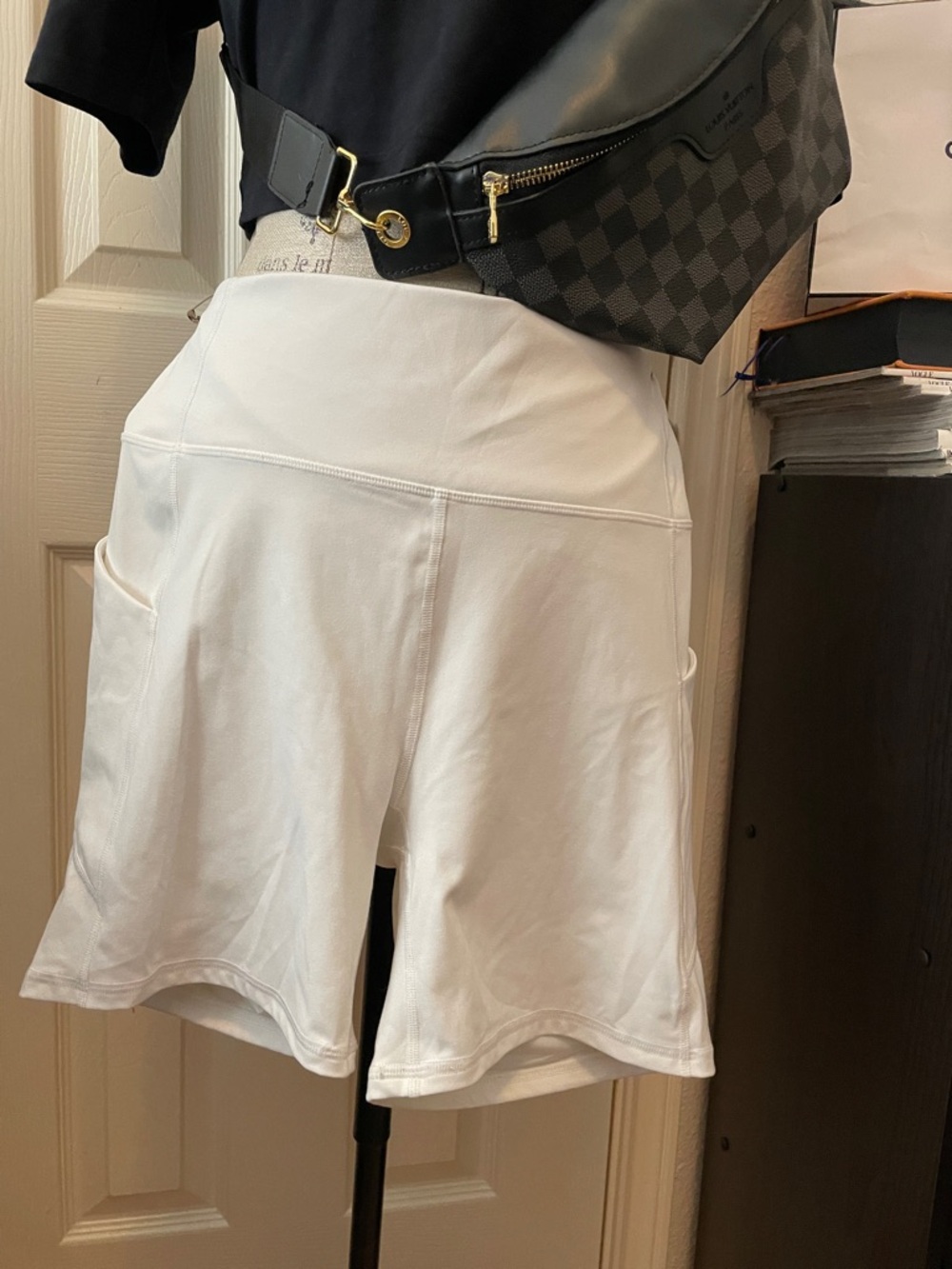 Women's White Athletic Shorts with High-Rise Waist and Side Pockets. No returns.